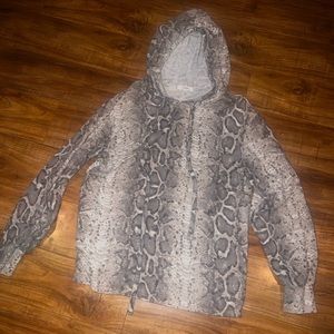 Soft fuzzy light pullover sweater with a gorgeous snack skin design